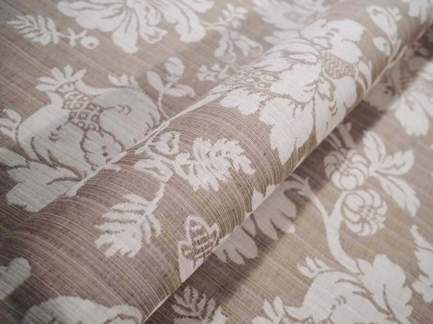 Close-up of MARY BEIGE jacquard fabric from Arte Fresca Outlet, revealing the intricate details of its large floral pattern, the subtle tonal beige colors, and the tactile, raised texture characteristic of jacquard weaving.