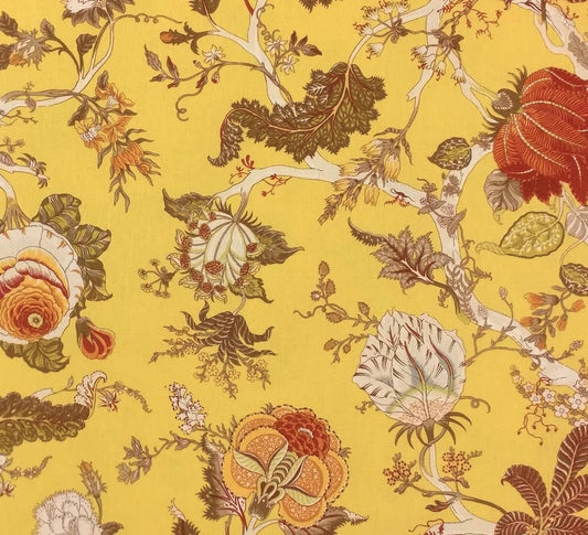 Villars Multi/Yellow fabric coupon by Arte Fresca Outlet, showing a large view of the vibrant botanical pattern on a bright yellow background. This printed 100% cotton fabric piece features intricate flowers in rust red and terracotta, with various brown and olive-green foliage, and accents of light green and cream, showcasing its smooth texture and elegant drape.