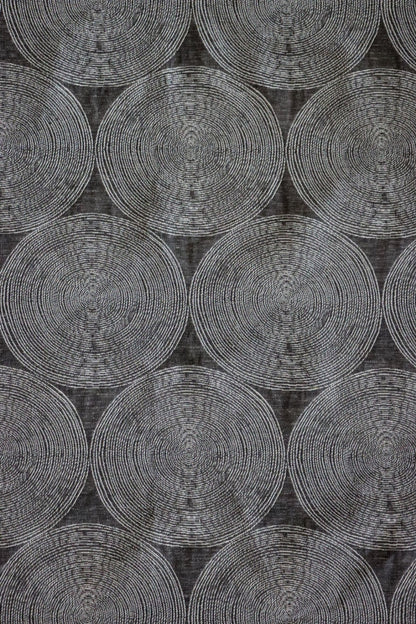 ADAM CHARCOAL fabric by Arte Fresca Outlet, a full view displaying its elegant deep anthracite base and subtle concentric circle pattern in cream and silver-grey, showcasing its woven texture and modern aesthetic.