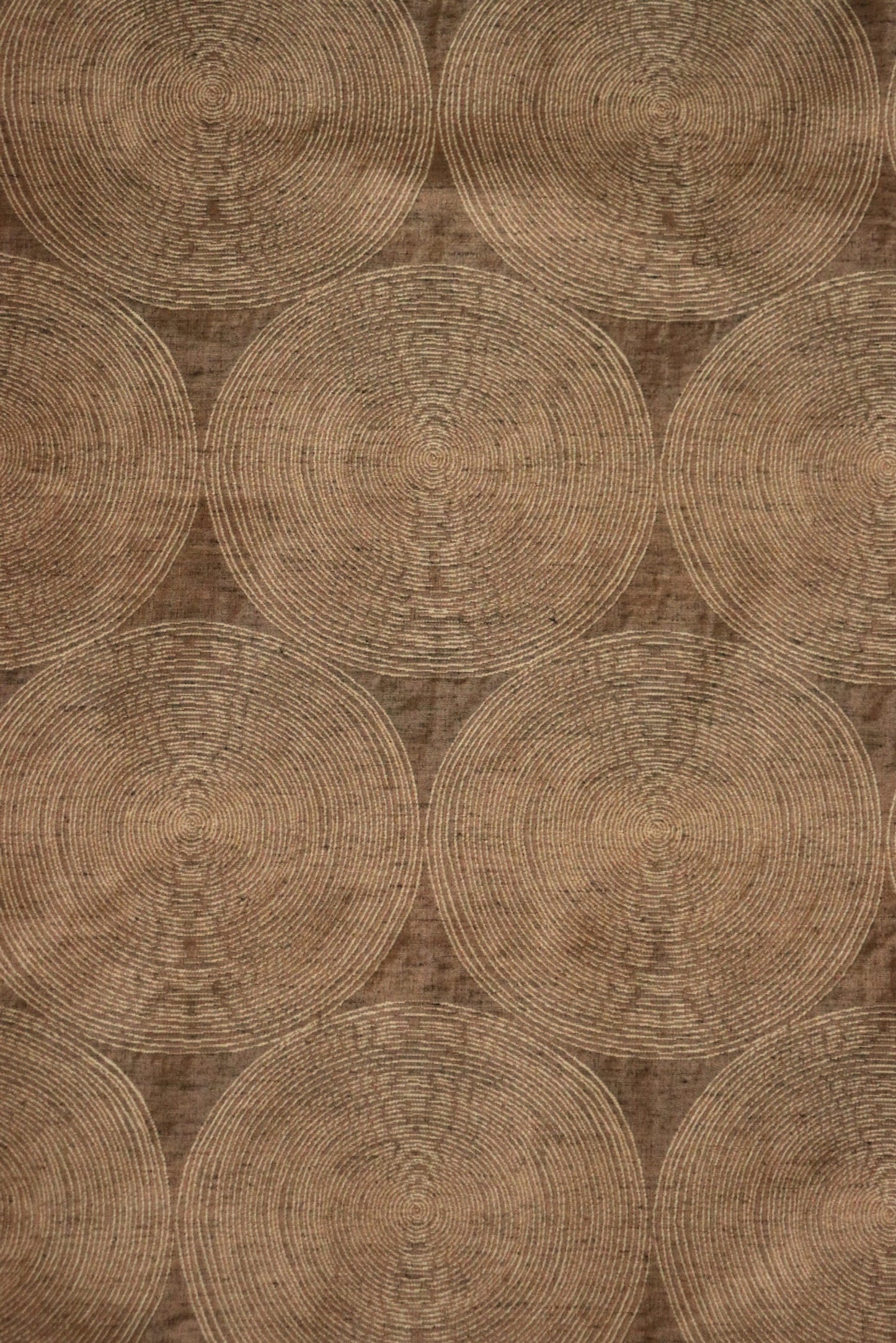 Voisin Gold fabric by Arte Fresca Outlet, showing a large section of the woven fabric with a subtle concentric circle pattern in cream on a rich copper background.