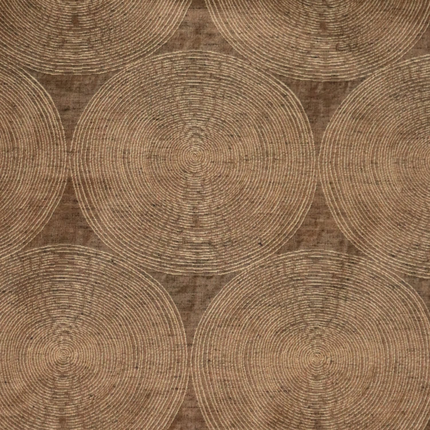 Close-up of Voisin Gold fabric by Arte Fresca Outlet, highlighting its fine weave, subtle cream concentric circles, and warm copper tones, revealing the tactile appeal and quality.