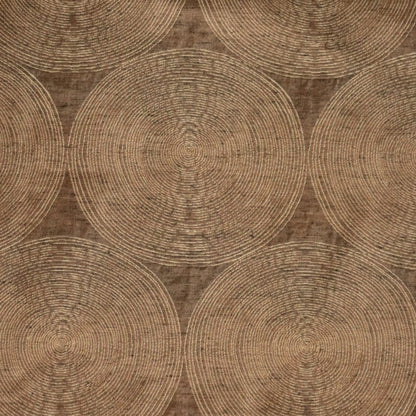 Close-up of Voisin Gold fabric by Arte Fresca Outlet, highlighting its fine weave, subtle cream concentric circles, and warm copper tones, revealing the tactile appeal and quality.