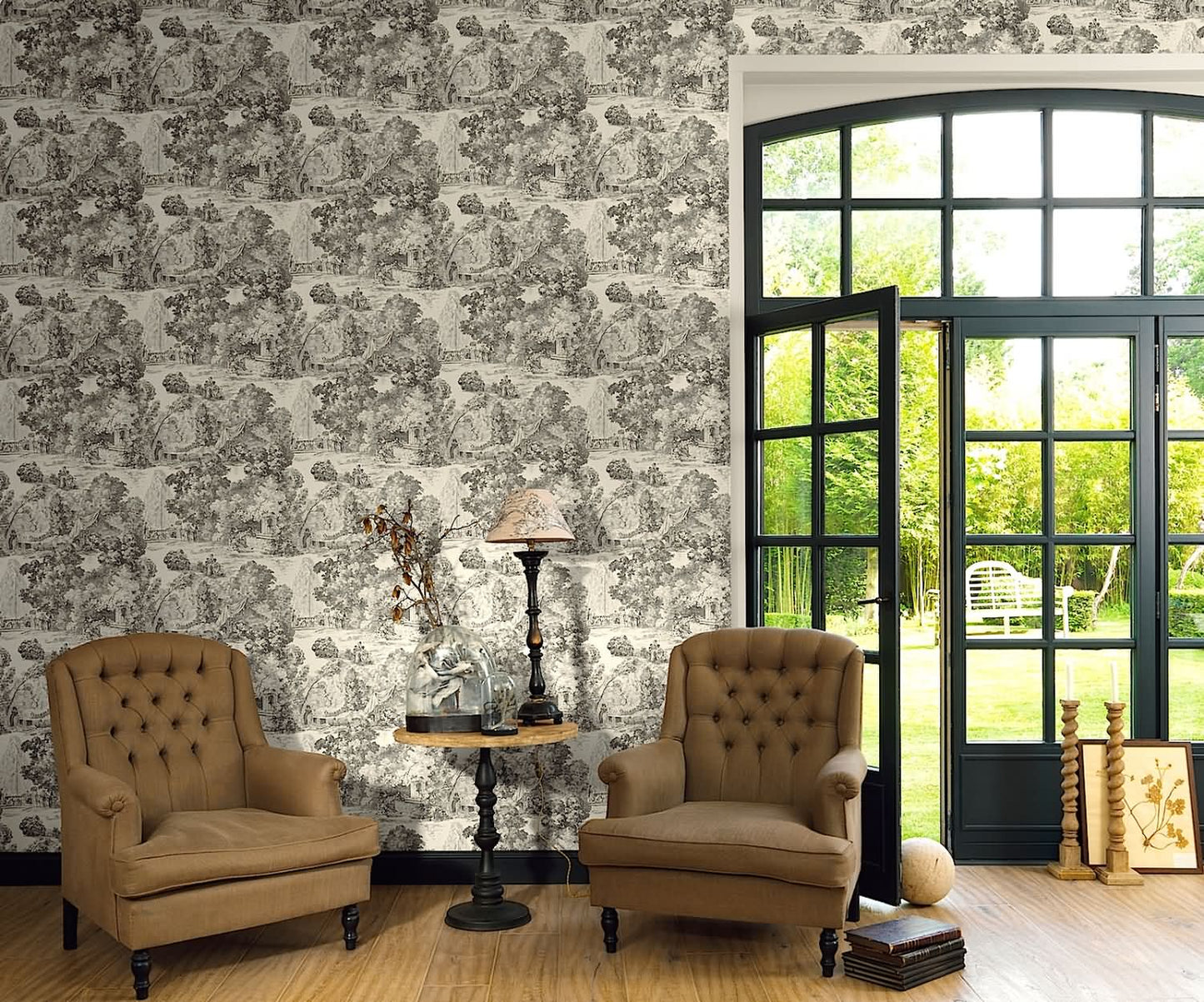 A room-view photo showcasing the Apolline wallpaper by Arte Fresca Outlet installed on a wall. Although the color is different from the product shown, this image illustrates the scale of the pattern and how the elegant Toile de Jouy design transforms a space with classic French charm and an air of sophistication.