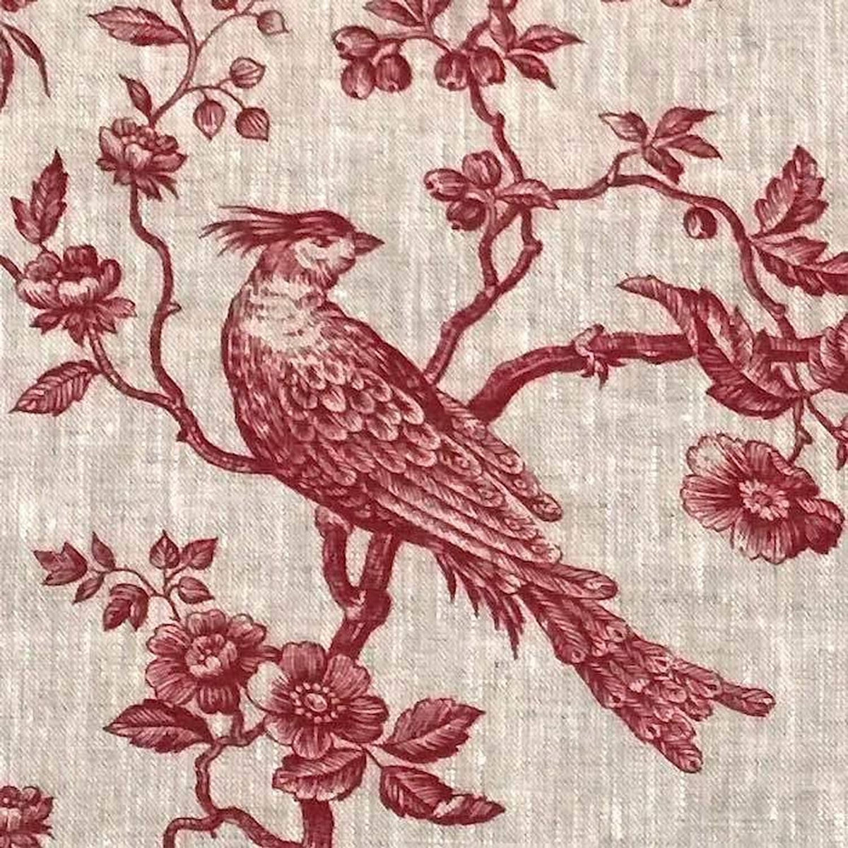 A detailed macro shot of the Arte Fresca Outlet Conway Lin Red fabric, highlighting the rich red pattern and the beautiful, rustic texture of the 100% linen.