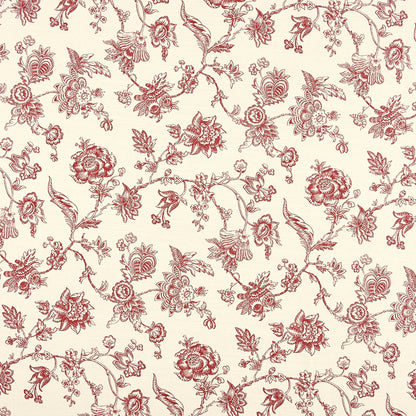 A repeating floral toile pattern in muted red on a warm cream background, with delicate vines and blossoms filling the frame.