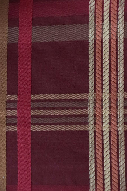 Close-up of Braxton Check Burgundy fabric by Arte Fresca Outlet, detailing the rich woven texture and the intricate plaid pattern with varied stripe widths and subtle rope-like lines in burgundy, gold, and pink.