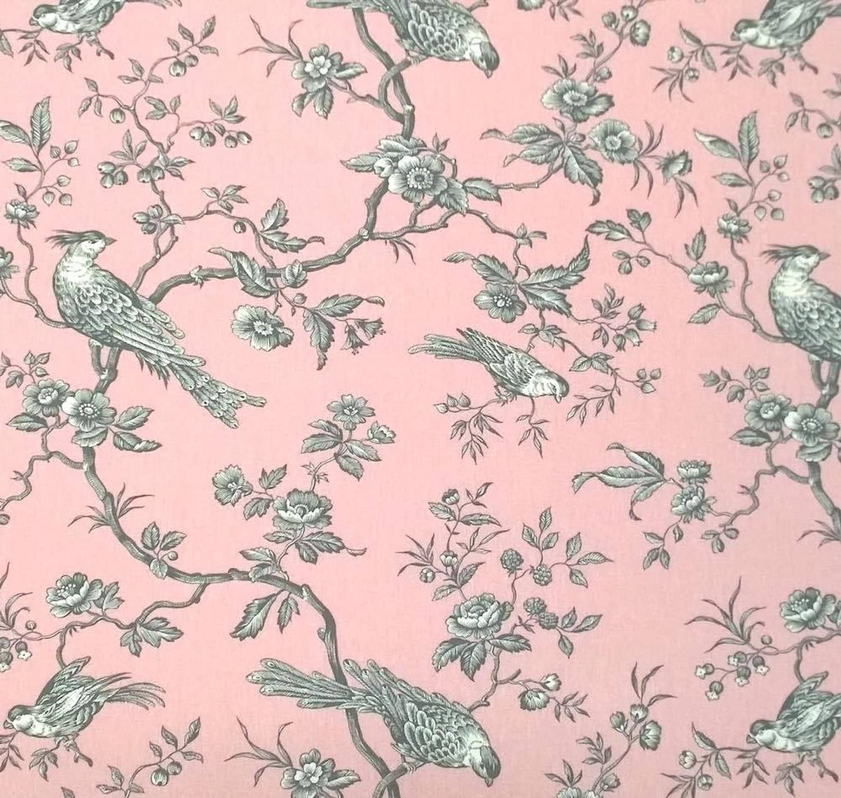 A large view of the Conway Rose French cotton fabric from Arte Fresca Outlet, featuring a romantic, grey bird and branch pattern on a soft rose-pink background.
