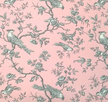 A large view of the Conway Rose French cotton fabric from Arte Fresca Outlet, featuring a romantic, grey bird and branch pattern on a soft rose-pink background.