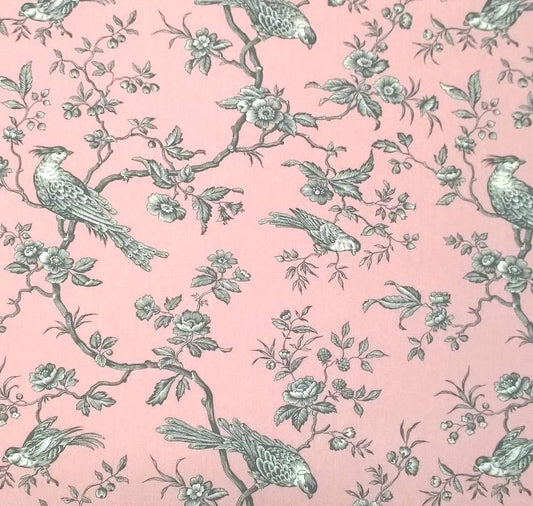 A large view of the Conway Rose French cotton fabric from Arte Fresca Outlet, featuring a romantic, grey bird and branch pattern on a soft rose-pink background.