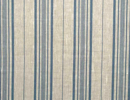 A close-up of a woven fabric with a textured beige background and vertical stripes in navy blue and thin gray lines.