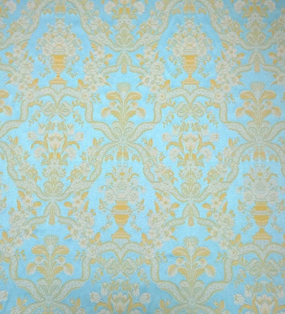 A large view of the Lorraine Turquoise woven fabric from Arte Fresca Outlet, showcasing the full damask pattern with cream-yellow motifs on a vibrant turquoise background.