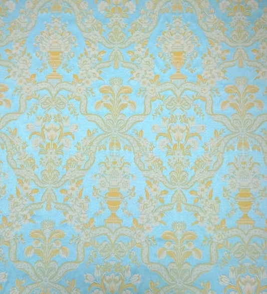 A large view of the Lorraine Turquoise woven fabric from Arte Fresca Outlet, showcasing the full damask pattern with cream-yellow motifs on a vibrant turquoise background.