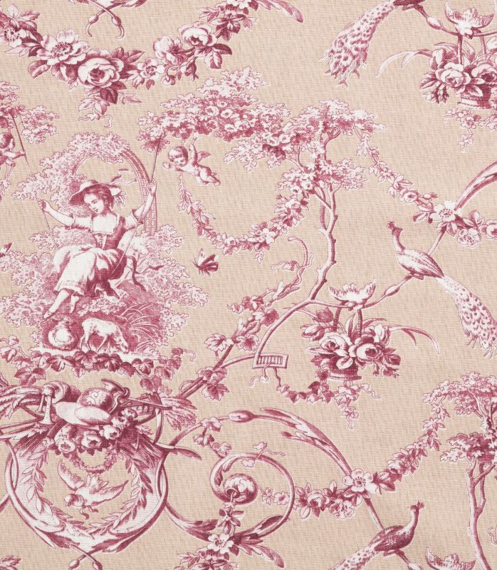 A close-up of a classic French Toile pattern fabric featuring a dusty rose print of cherubs, peacocks, and floral motifs on a warm beige background.