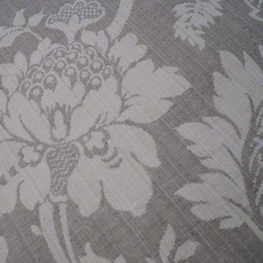 Detailed close-up of MARY GREY fabric by Arte Fresca Outlet, highlighting the intricate woven floral motifs and subtle texture of this elegant grey and beige jacquard.
