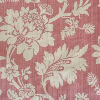 Close-up of MARY ROSE jacquard fabric from Arte Fresca Outlet, revealing its intricate woven texture and detailed floral motif. Creamy white rose and peony-like blossoms are prominent against the soft old rose background, showcasing the tactile elevation of the pattern and the fabric's luxurious composition.