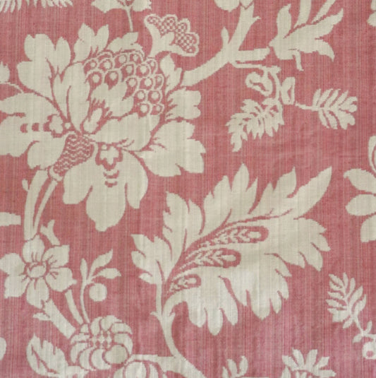 Close-up of MARY ROSE jacquard fabric from Arte Fresca Outlet, revealing its intricate woven texture and detailed floral motif. Creamy white rose and peony-like blossoms are prominent against the soft old rose background, showcasing the tactile elevation of the pattern and the fabric's luxurious composition.