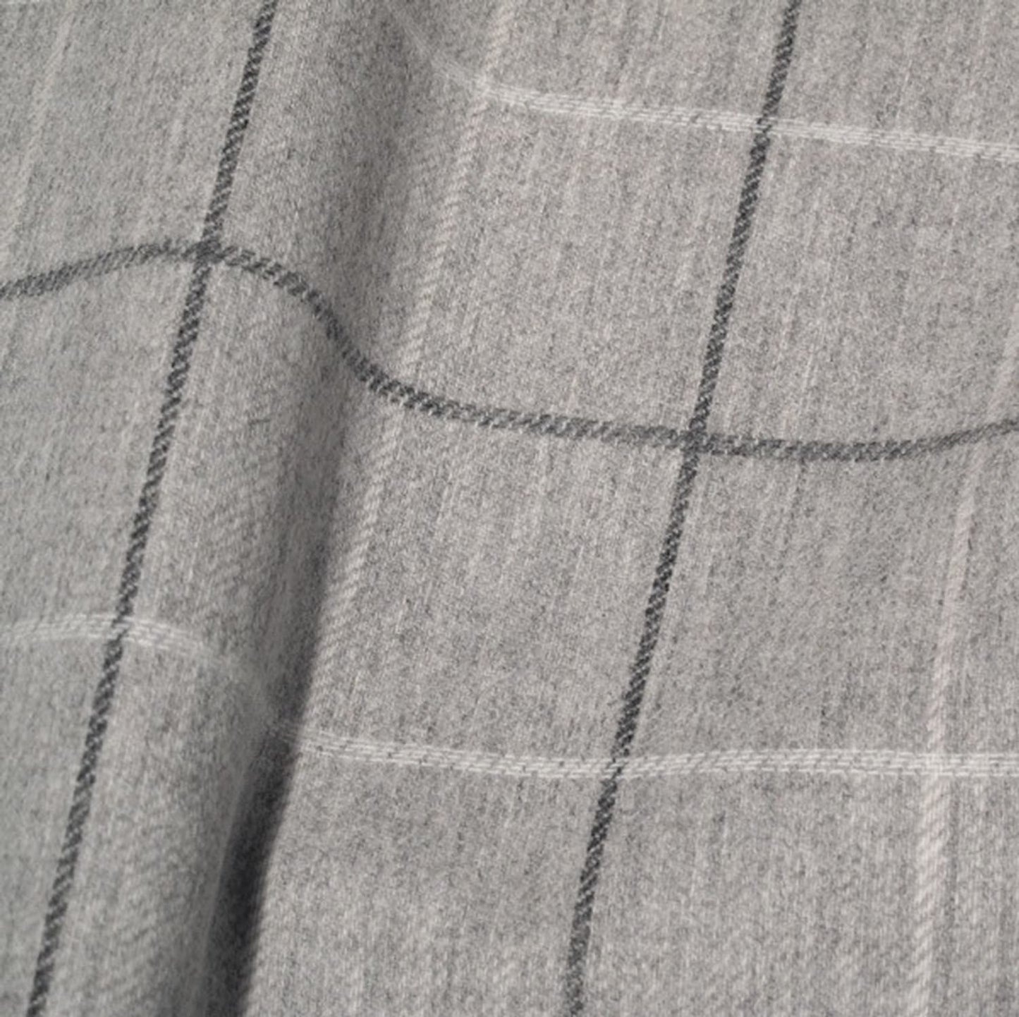 Close-up of OXFORD CHECK GREY fabric from Arte Fresca Outlet, revealing the fine woven lines of the classic check pattern, the melange grey, anthracite, and cream-white tones, and the soft, dense texture of 100% wool.