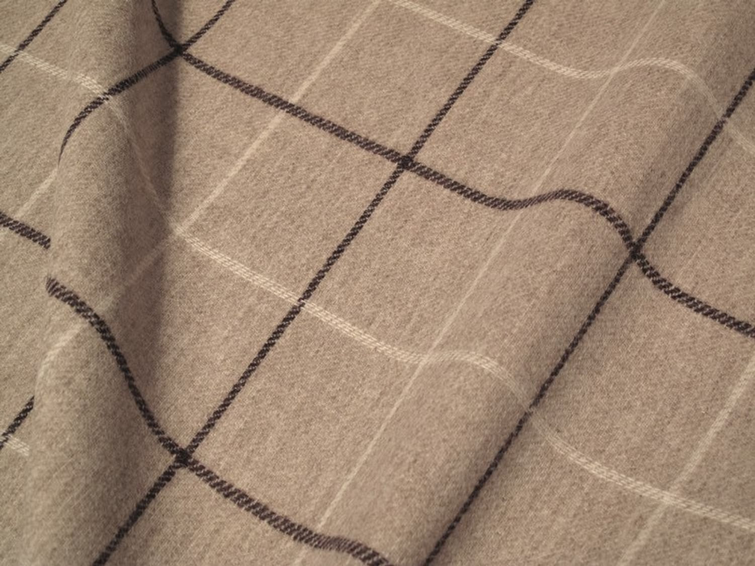 OXFORD CHECK PLUM fabric by Arte Fresca Outlet, a luxurious 100% wool heavy woven textile with a soft, warm feel. It features a classic check pattern in warm light beige, accented with subtle plum and cream white lines, ideal for curtains and upholstery.