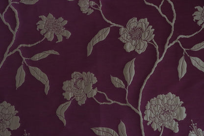  Close-up of PENCARROW DARK RED silk fabric from Arte Fresca Outlet, highlighting the intricate floral pattern, elegant relief-like structure, and soft silken sheen on its dark red base with gold undertones.