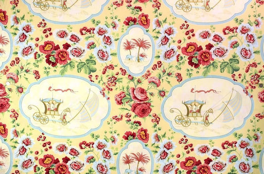 A large view of the SULTANS VOYAGE MULTI/YELLOW fabric from Arte Fresca Outlet, featuring a vibrant, exotic floral pattern with historical medallions on a warm yellow background.