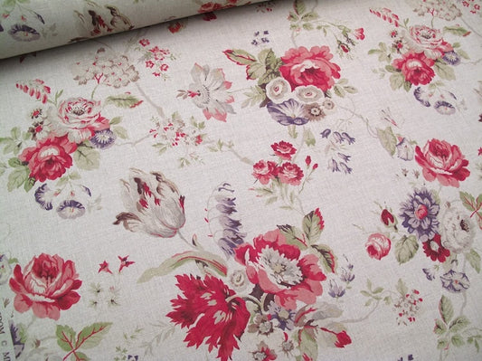 A wide view of VICTORIA LINEN MULTI/GREEN fabric from ARTE FRESCA OUTLET, showcasing its rich, large-scale floral pattern of roses and garden blooms in reds, purples, and greens on a natural linen-blend base, ideal for curtains or upholstery.
