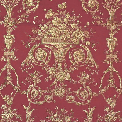  A close-up of the reduced-price VILLA BORGHESE fabric coupon from Arte Fresca Outlet. The image shows the full, opulent pattern of rococo flowers and ornaments in shimmering gold on a rich red background, highlighting the quality of the woven fabric.