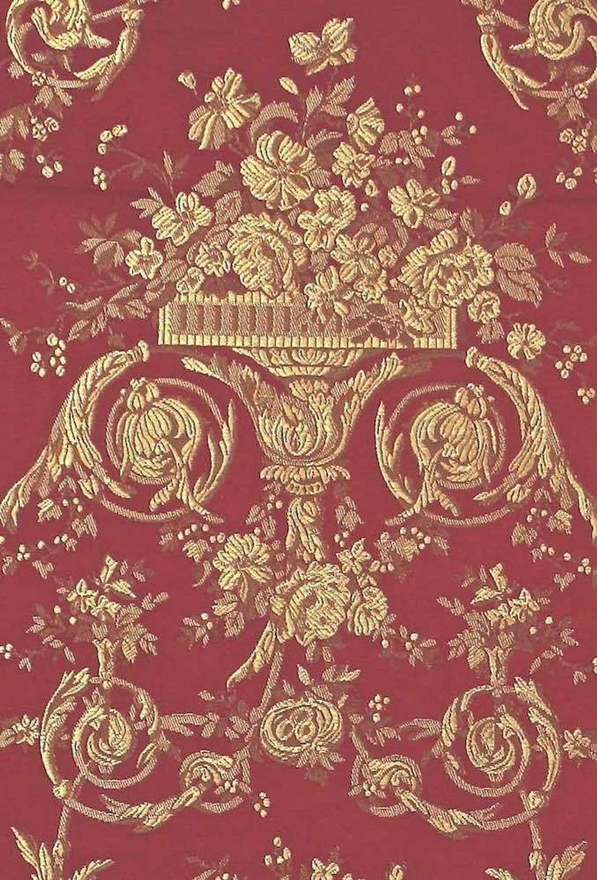 A close-up of the reduced-price VILLA BORGHESE fabric coupon from Arte Fresca Outlet. The image shows the full, opulent pattern of rococo flowers and ornaments in shimmering gold on a rich red background, highlighting the quality of the woven fabric.