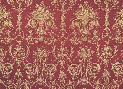A close-up of the reduced-price VILLA BORGHESE fabric coupon from Arte Fresca Outlet. The image shows the full, opulent pattern of rococo flowers and ornaments in shimmering gold on a rich red background, highlighting the quality of the woven fabric.