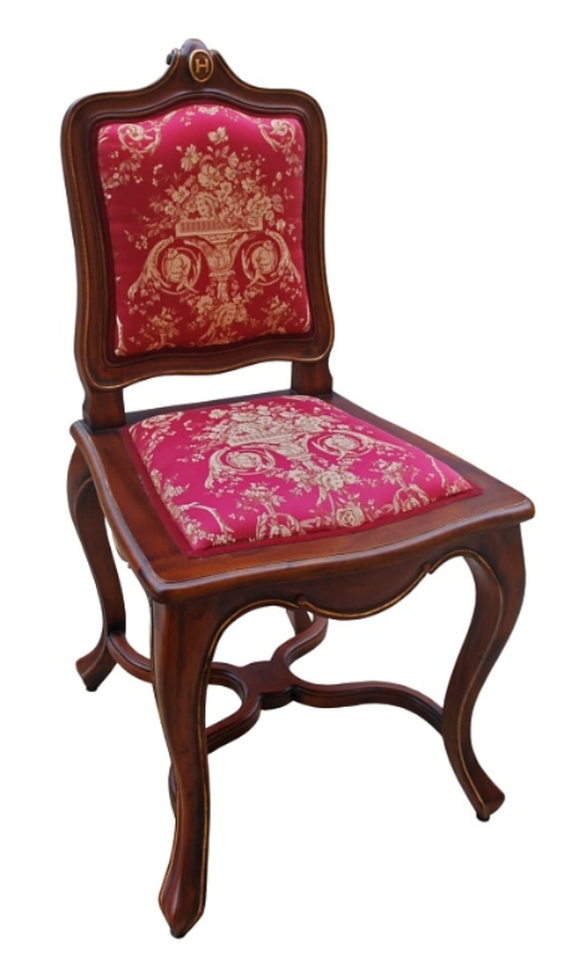 An antique or vintage-style chair beautifully upholstered with the VILLA BORGHESE fabric coupon. The image highlights the fine details of the red and gold rococo pattern and its classic, luxurious look, making it a perfect choice for restoring furniture.