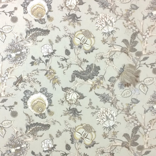 Villars Beige/Gray fabric coupon by Arte Fresca Outlet, showing a large view of its detailed botanical pattern. This printed 100% cotton fabric features lifelike illustrations of various flowers and plants predominantly in muted gray and beige tones with subtle hints of yellow or olive on a light beige-gray background, displaying a smooth texture.