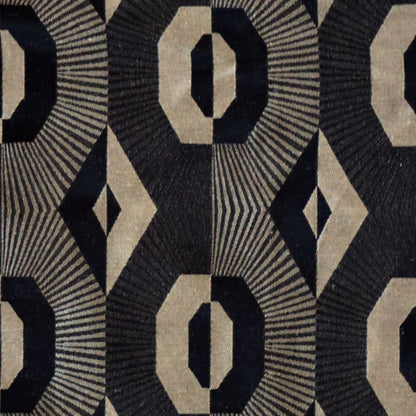 Close-up detail of Voisin Black fabric from Arte Fresca Outlet, highlighting the intricate reversible weave and luxurious texture of this English curtain and upholstery material.