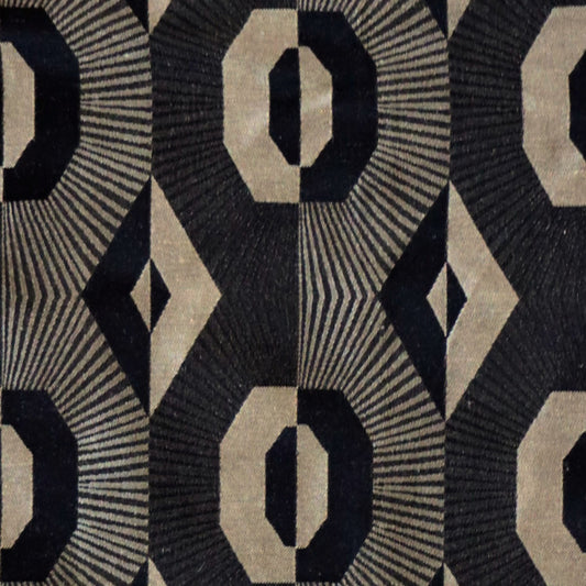 Close-up detail of Voisin Black fabric from Arte Fresca Outlet, highlighting the intricate reversible weave and luxurious texture of this English curtain and upholstery material.
