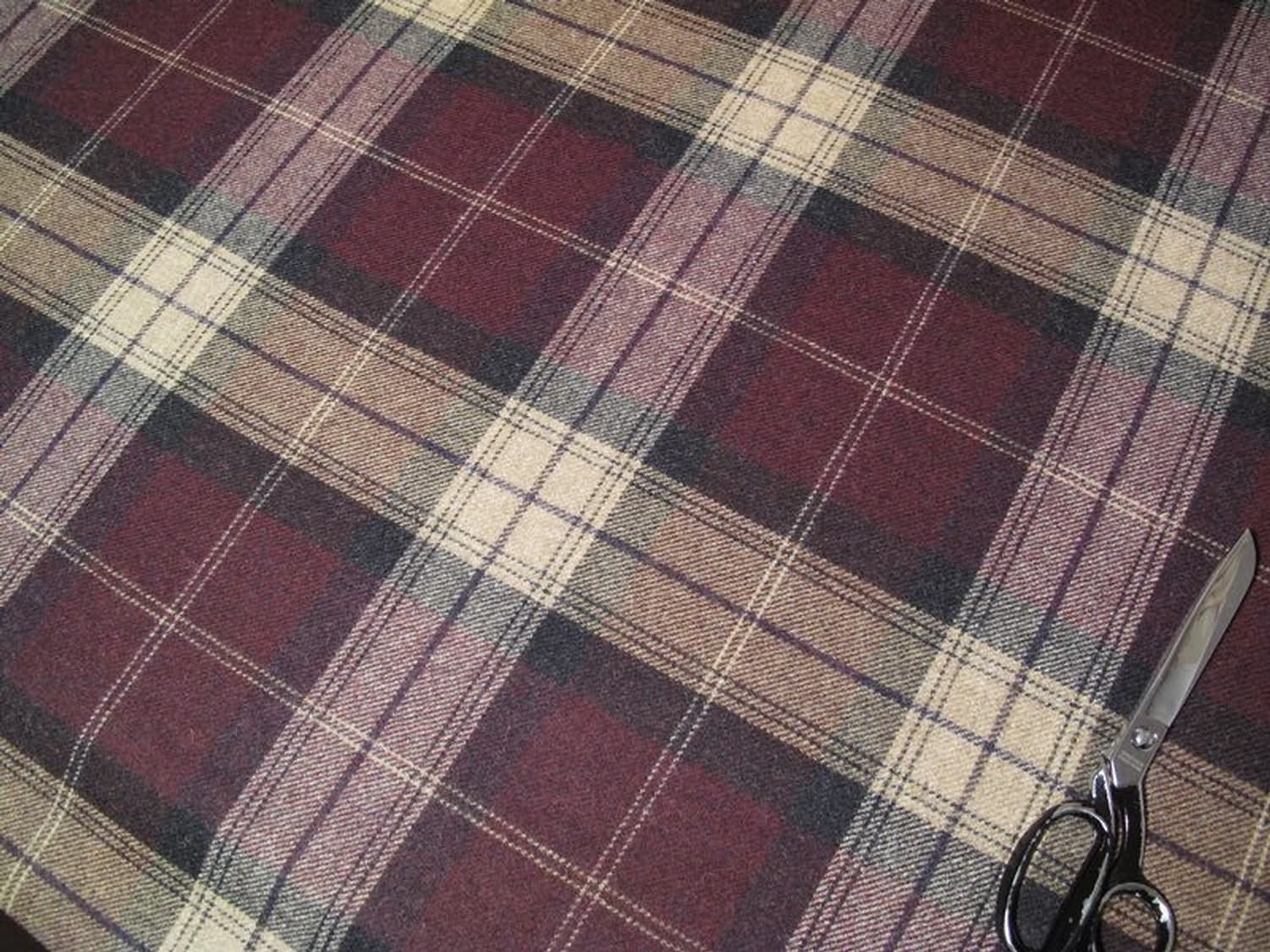 YORK PLAID PLUM fabric by Arte Fresca Outlet, a heavy 100% wool woven textile with a visible texture. It features a large-scale classic plaid pattern in deep plum-red/bordeaux and beige tones, accented with fine cream and subtle gray-blue/mauve lines, perfect for durable upholstery (30,000 Martindale).